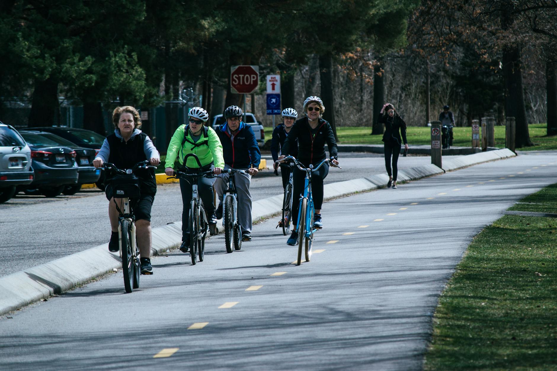 five person riding bikes